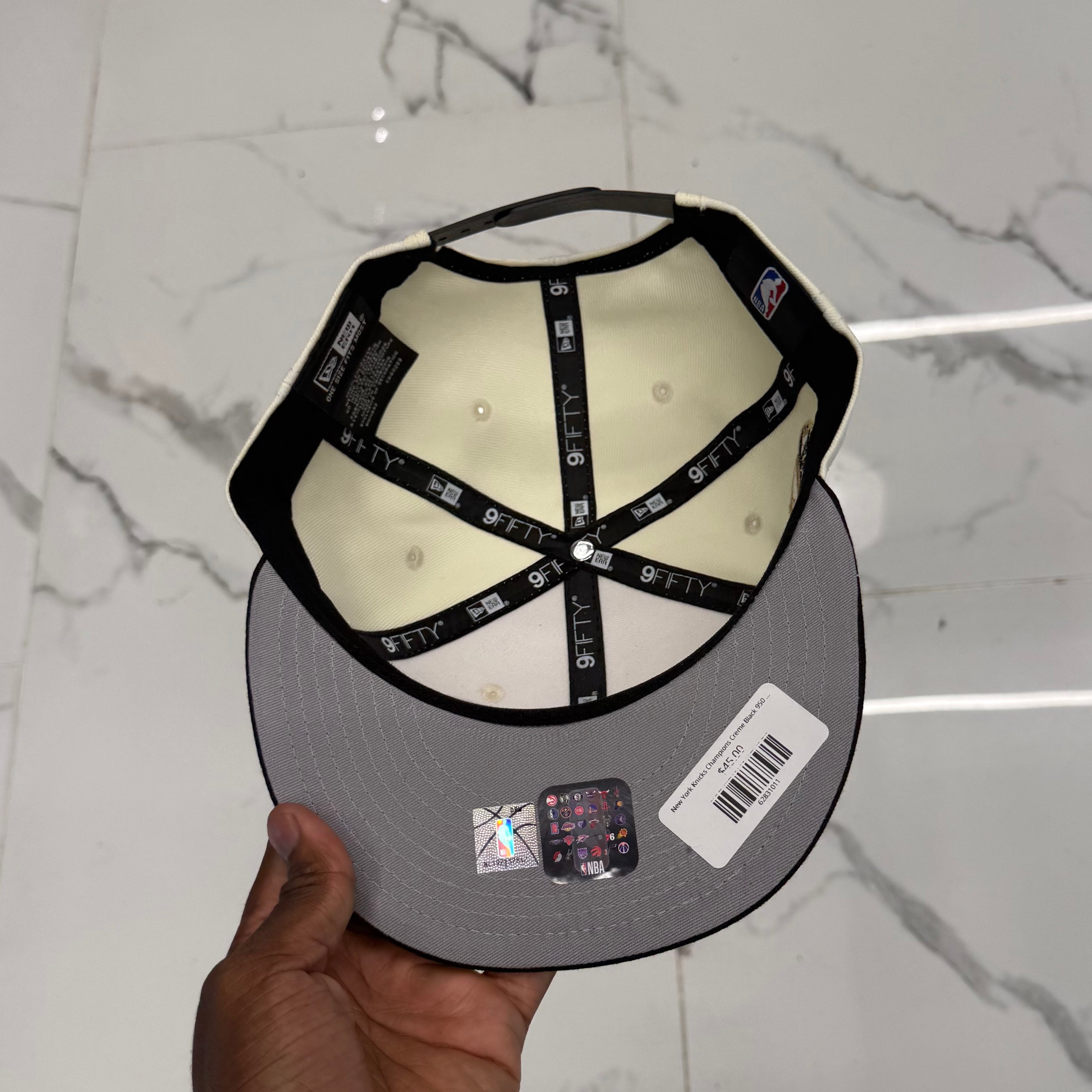 New York Knicks 950 Classic Creme and Black Champions 2026 Snap Back