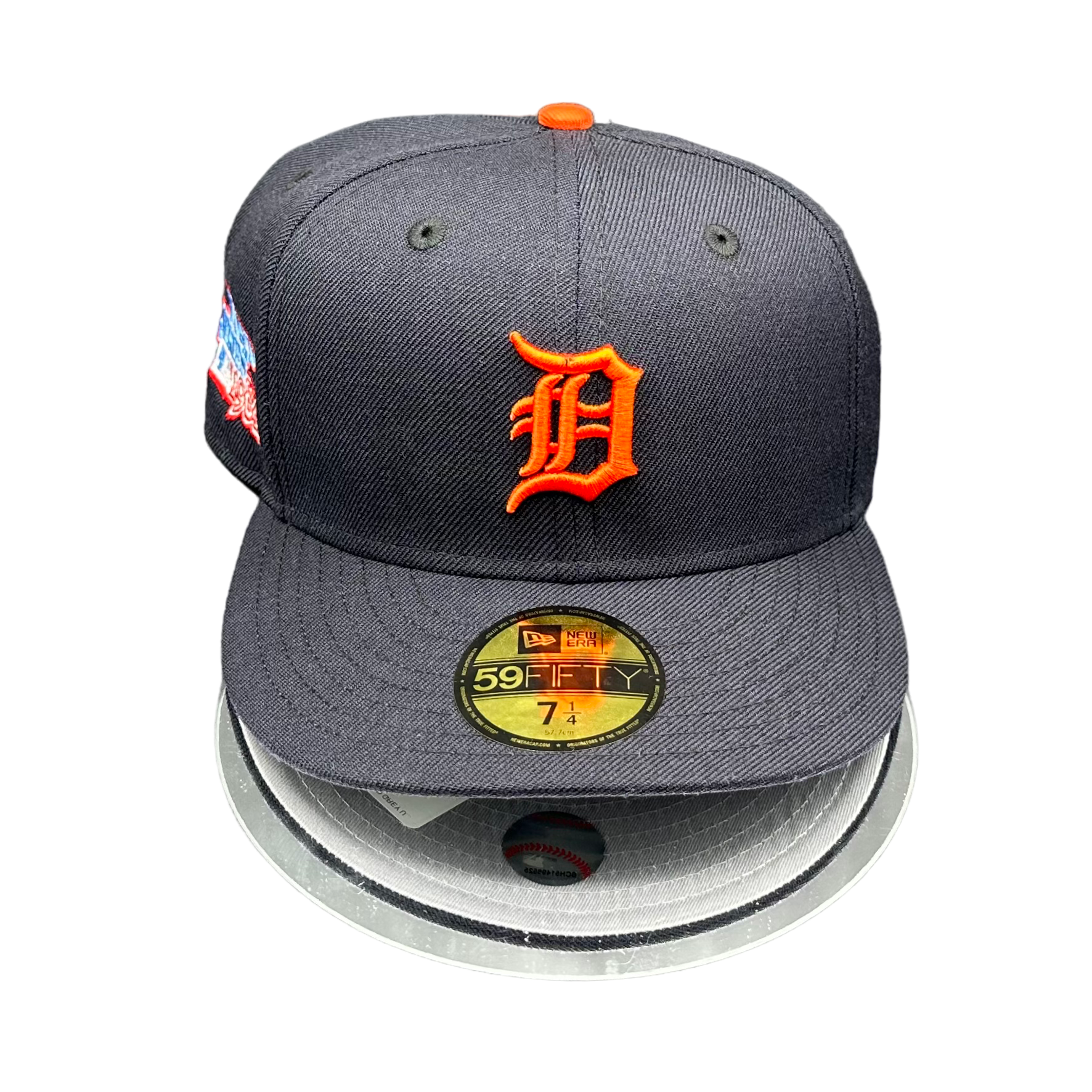 A fitted Detroit Tigers baseball cap with an all navy crown and visor, featuring an orange logo, grey under visor, and a 1984 World Series side patch.